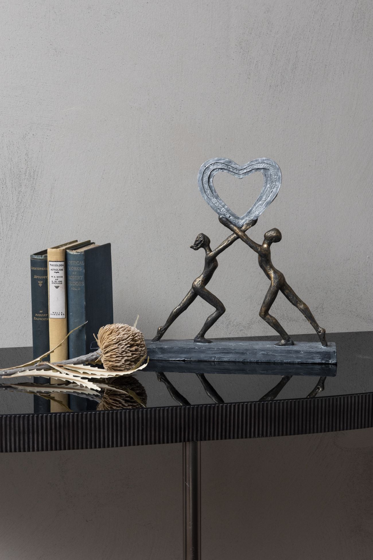 Uplifting Love Couple Sculpture